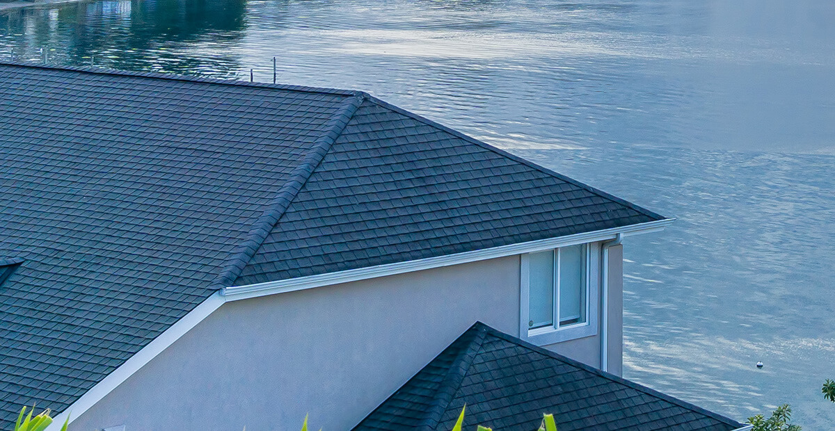 Architectural asphalt shingle roof installed on a waterfront home in Conneaut Lake, PA.